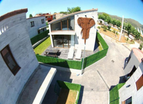 Отель Cabañas Salvajes De Cabarceno  Пенагос